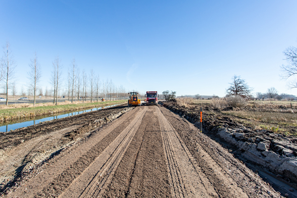 Tensar TriAx TenCate Polyfelt TS versterken bouwweg windmolenpark knooppunt Deil